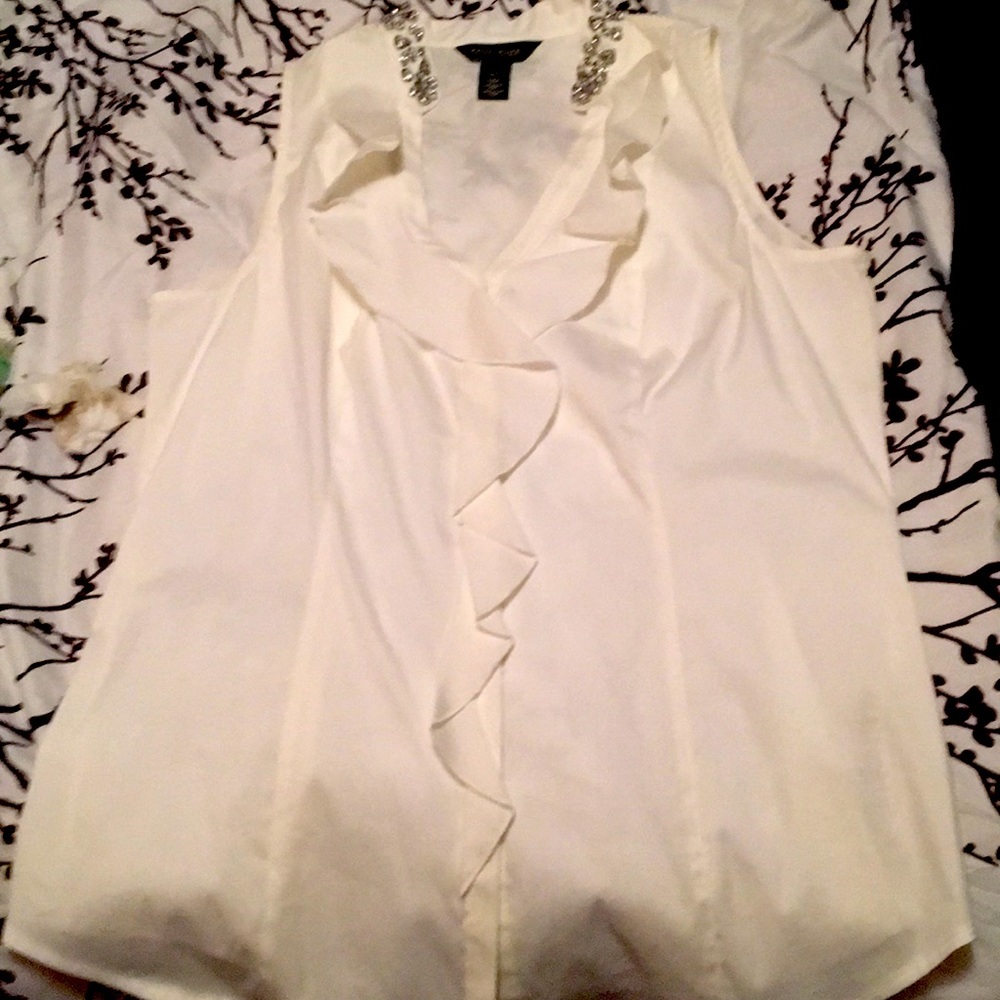 white sleeveless blouse by White House black mark